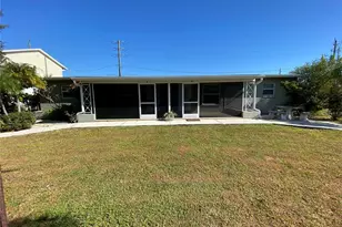 394 N Spring Lake Blvd NW, Port Charlotte, FL 33952 - Photo 1