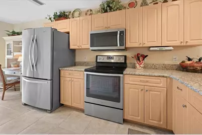 9550 Fiddlers Green Circle #206, Rotonda West, FL 33947 - Photo 7