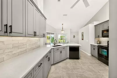 1054 Boundary Boulevard, Rotonda West, FL 33947 - Photo 13