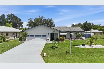 1042 Malay Terrace NW, Port Charlotte, FL 33948 - Photo 1