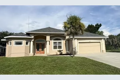 857 Boundary Boulevard, Rotonda West, FL 33947 - Photo 1