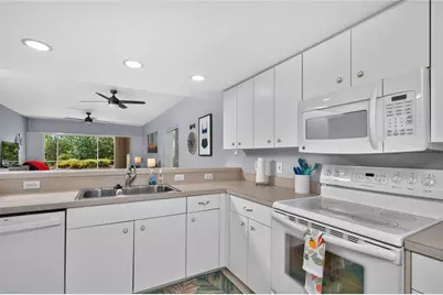 9500 Fiddlers Green Circle #101, Rotonda West, FL 33947 - Photo 13