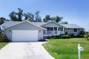 18 Pebble Beach Rd, Rotonda West, FL 33947 - Photo 1
