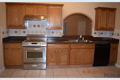 24 Poplar Drive, Palm Coast, FL 32164 - Photo 7