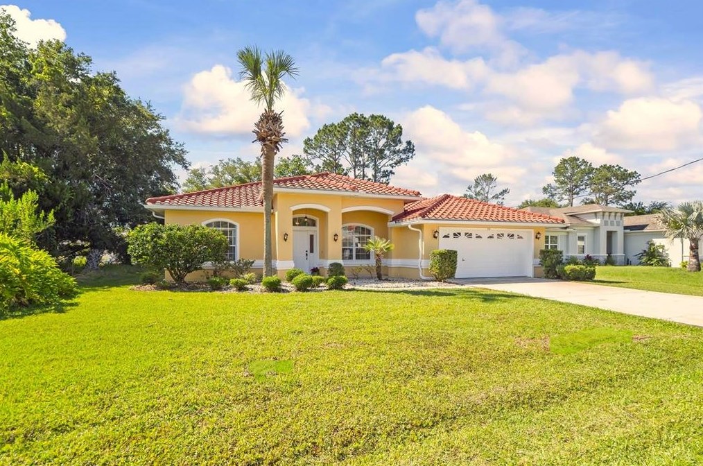 50 Persimmon Dr, Palm Coast FL  32164-7450 exterior