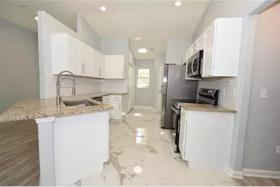 75 Bird Of Paradise Drive, Palm Coast, FL 32137 - Photo 13
