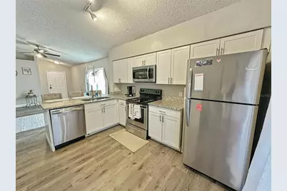 7047 Hickory Branch Circle, Orlando, FL 32818 - Photo 9