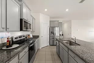 8104 Penrose Pl, Wildwood, FL 34785 - Photo 7