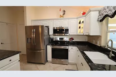 17716 SE 89th Milford Avenue, The Villages, FL 32162 - Photo 15