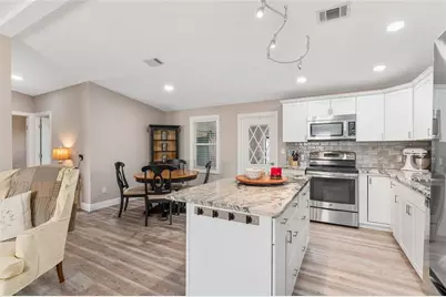 1404 Torrey Pines Drive, The Villages, FL 32159 - Photo 15