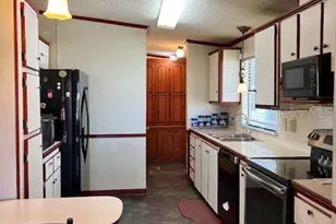 2353 W Coach N' 4 Dr, Leesburg, FL 34748 - Photo 13