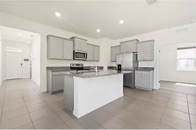 8128 Penrose Place, Wildwood, FL 34785 - Photo 9