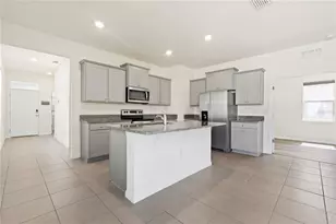 8128 Penrose Pl, Wildwood, FL 34785 - Photo 9