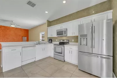 4718 Waterside Pointe Circle, Orlando, FL 32829 - Photo 13