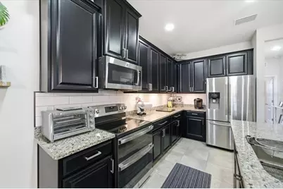 10591 Heron Hideaway Loop, Land O Lakes, FL 34638 - Photo 11