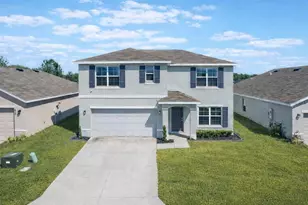 8595 Triumph Cir, Wildwood, FL 34785 - Photo 1