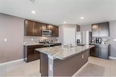 8595 Triumph Circle, Wildwood, FL 34785 - Photo 13