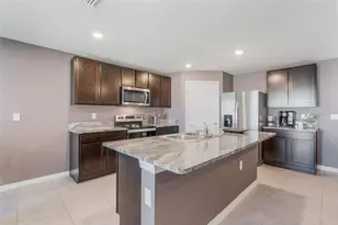 8595 Triumph Cir, Wildwood, FL 34785 - Photo 13