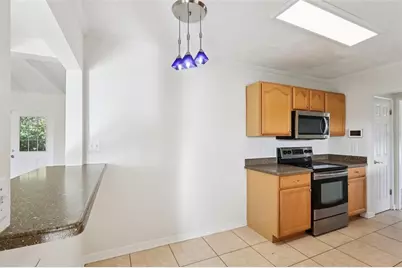 131 E Palmetto Avenue, Howey in the Hills, FL 34737 - Photo 17