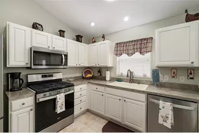 8702 SE 166th Birchbrook Loop, The Villages, FL 32162 - Photo 7