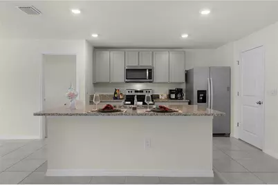 8661 Triumph Circle, Wildwood, FL 34785 - Photo 9