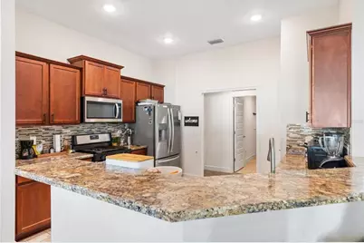 9778 Pepper Tree Place, Wildwood, FL 34785 - Photo 15