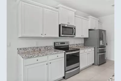 7889 Penrose Place, Wildwood, FL 34785 - Photo 17