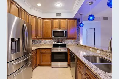 1051 Winding Pines Circle #105, Cape Coral, FL 33909 - Photo 3
