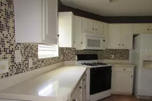 1142 Meadowbend Dr, Leesburg, FL 34748 - Photo 9