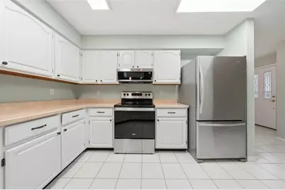 8928 Village Green Boulevard, Clermont, FL 34711 - Photo 11