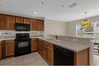 5901 Candle Glow Place, Leesburg, FL 34748 - Photo 21
