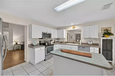1302 Jimenez Court, The Villages, FL 32159 - Photo 13