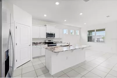 7926 Penrose Place, Wildwood, FL 34785 - Photo 7