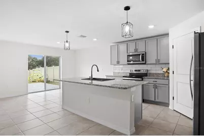 8673 Triumph Circle, Wildwood, FL 34785 - Photo 9