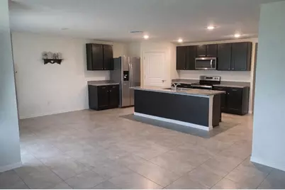 4676 Sigcom Place, Wildwood, FL 34785 - Photo 7
