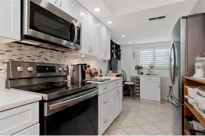 9450 Harbor Greens Way #308, Seminole, FL 33776 - Photo 13