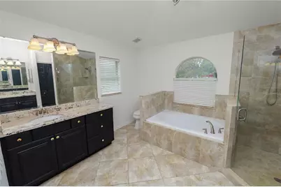 18231 Commonwealth Avenue N, Polk City, FL 33868 - Photo 25