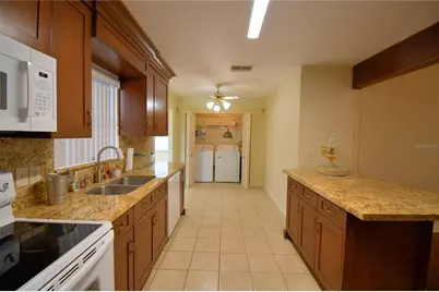 1690 Colonnades Circle N, Lakeland, FL 33811 - Photo 13