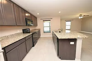 1563 Swan Lake Cir, Dundee, FL 33838 - Photo 11