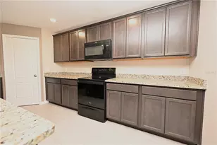 1563 Swan Lake Cir, Dundee, FL 33838 - Photo 7