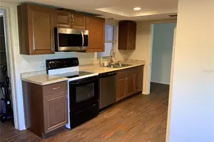 3318 Village Green Dr, Sarasota, FL 34239 - Photo 5