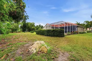 597 Aston Woods Ct, Venice, FL 34293 - Photo 43