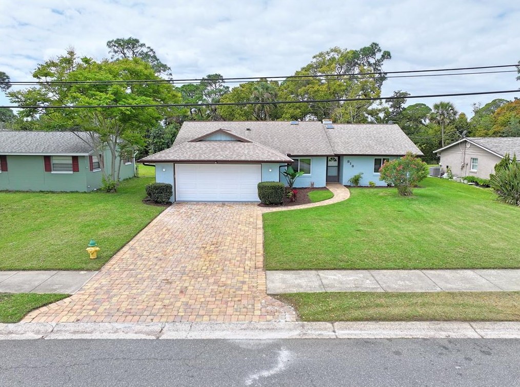 818 Fairway Dr, New Smyrna FL  32168-6117 exterior