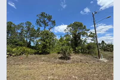 513 Addison Street E, Lehigh Acres, FL 33974 - Photo 1