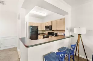 12837 Madison Pointe Cir, Orlando, FL 32821 - Photo 9