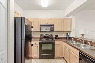 12837 Madison Pointe Circle #206, Orlando, FL 32821 - Photo 7