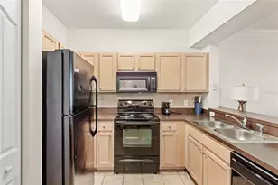 12837 Madison Pointe Cir, Orlando, FL 32821 - Photo 7