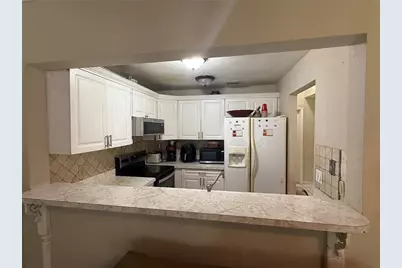 7104 Blue Earth Court, Orlando, FL 32818 - Photo 9