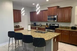 8894 Candy Palm Rd, Kissimmee, FL 34747 - Photo 5