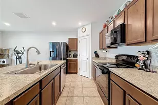 408 Button Sage Ln, Davenport, FL 33837 - Photo 7